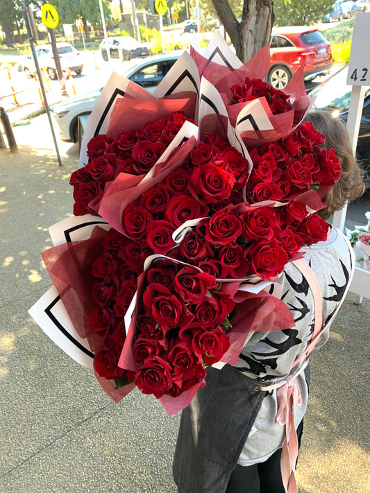 Bunch of red roses wrapped