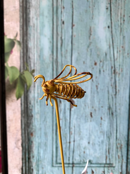 Bee on wire stick